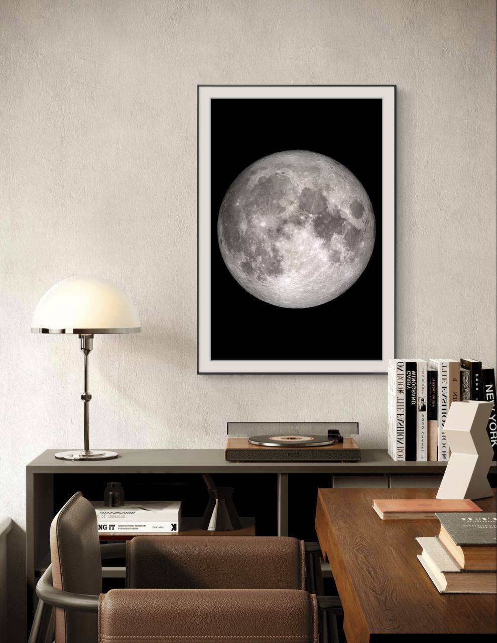 Here, the same full moon poster is displayed beautifully in a contemporary interior setting, framed and hung on a soft-textured wall. The minimalist frame complements the simplicity and elegance of the lunar image, allowing the moon's details to take center stage. Perfect for any modern living space, office, or study, this Printed Poster can effortlessly elevate the aesthetic of a room. Its sharp details and striking contrast make it an eye-catching addition to any Home Gallery Wall or a stylish piece of Ro