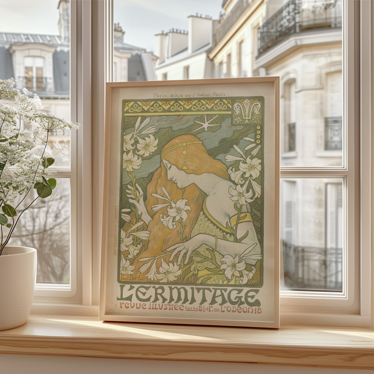 An Art Nouveau poster showing a woman in profile with flowing golden hair, surrounded by white lilies. She holds a flower gently, set against a soft green background with natural patterns. The title "L'Ermitage" is at the bottom in decorative lettering, with a Paris address below.