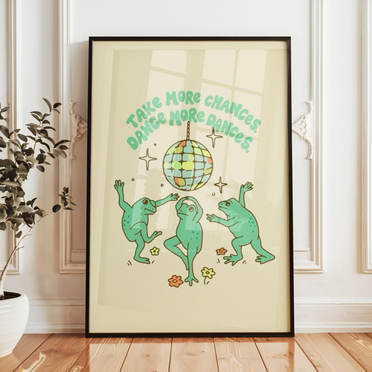 The artwork on the poster is whimsical and playful, featuring three green frogs dancing under a sparkling disco ball