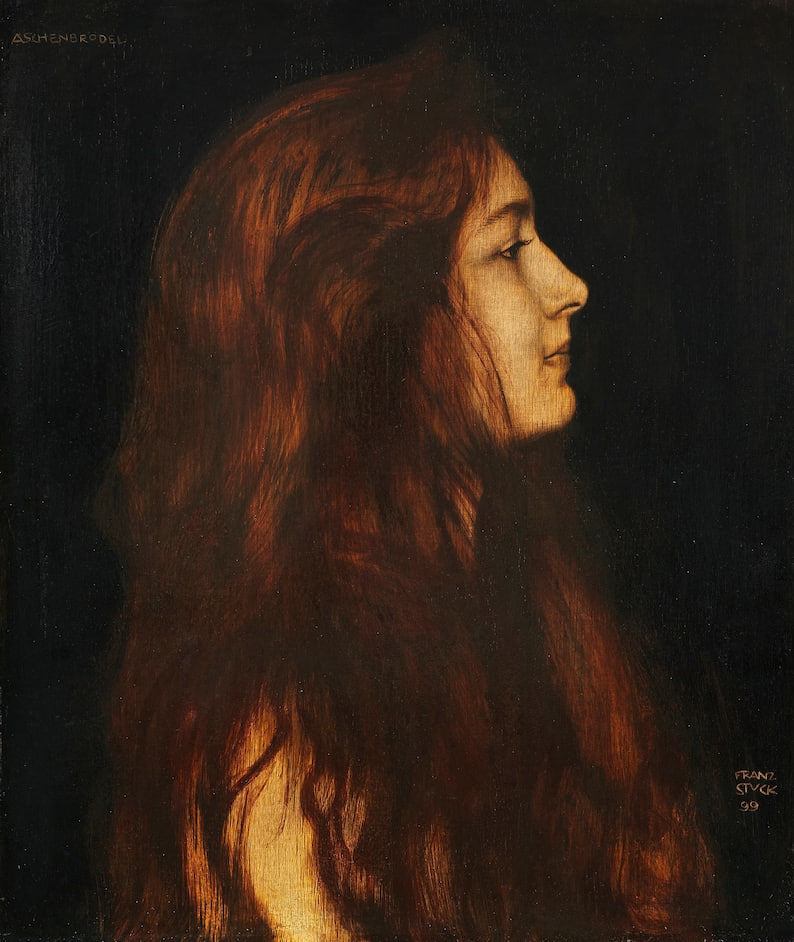 A portrait painting of a young woman with long, wavy red hair cascading down her back and shoulders. She is shown in profile, gazing forward with a serene expression. The background is dark and contrasts with the warm tones of her hair and skin, emphasizing the luminosity and texture of the painting. The artist's signature appears in the lower right corner.