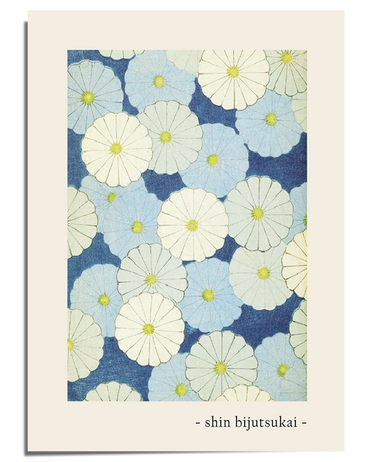 A traditional Japanese-style artwork featuring a repeating floral pattern of white and light blue chrysanthemum flowers. The petals are finely detailed, and the flowers are arranged against a deep blue background, creating a striking yet harmonious contrast. The design is framed by a cream-colored border with the title "Shin Bijutsukai" written at the bottom in a simple, elegant font.