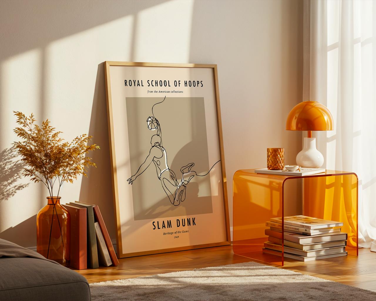Framed artwork on a wall with a modern interior setting featuring a lamp and books.